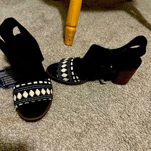 Brand new Toms ... never worn